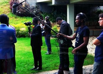 Journalists interviewing a scientist at Next Einstein Forum in Kigali