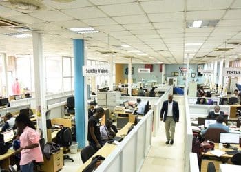 African journalists working in the New Vision newsroom in Kampala, Uganda, a Script media partner