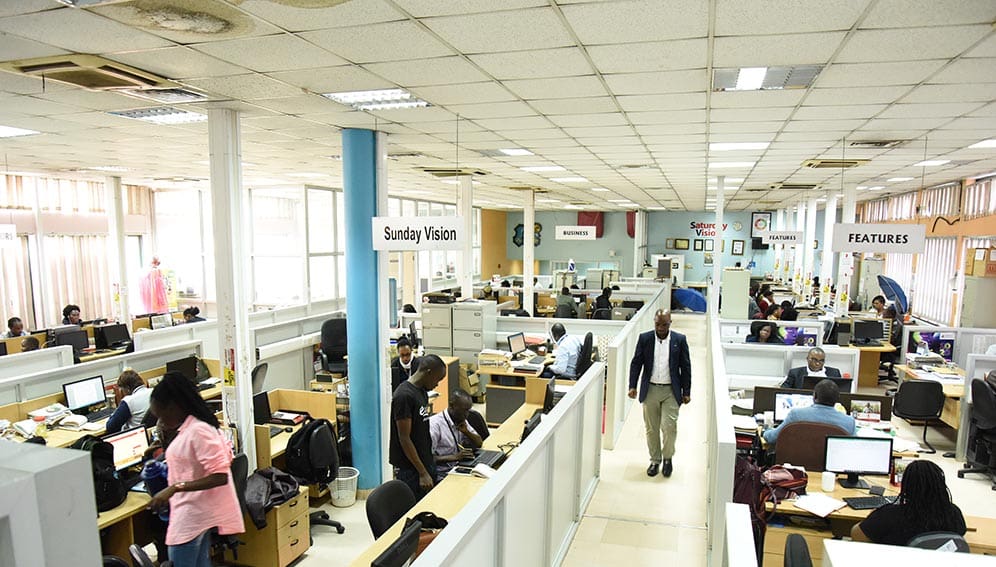 Journalists in the New Vision newsroom